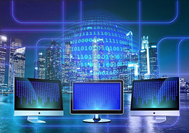 Illustration: Multiple computer screens arranged in a futuristic environment.