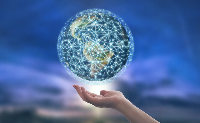 Illustration: Globe surrounded by a glowing network levitating over a cupped hand.
