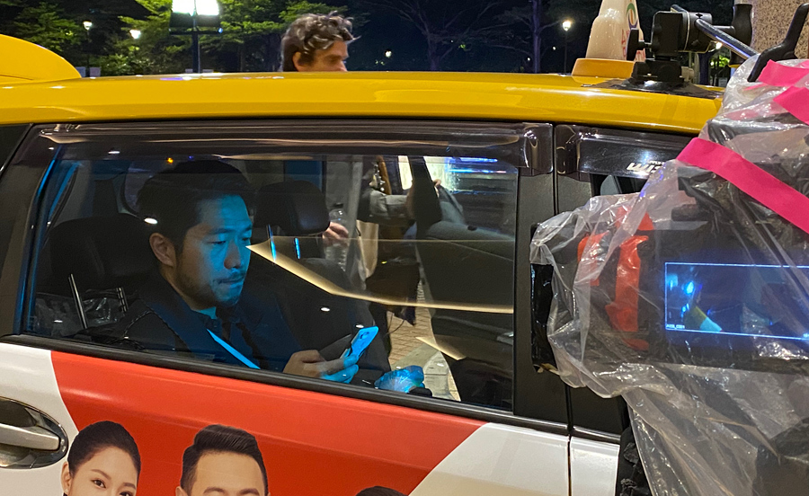 Behind the scenes: Arthur Huang in a taxi