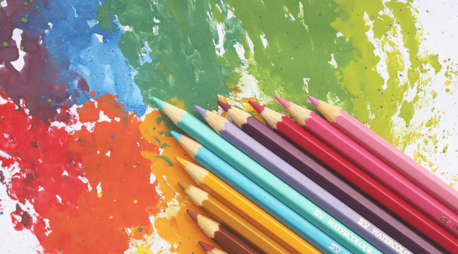 Title illustration: Color splashes and pencils