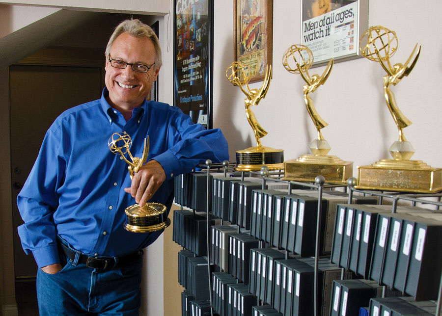 Chris Schueler with Emmy trophies